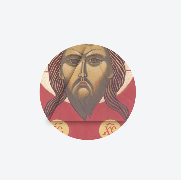 Szara plansza z grafiką przedstawiającą Jezusa z Ikony.