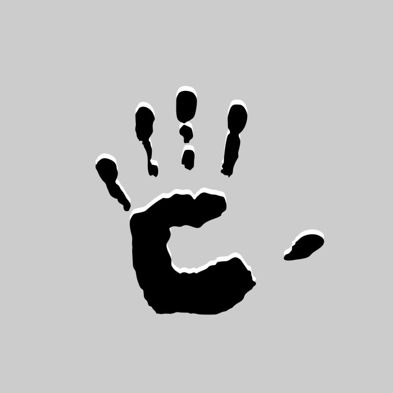 Na grafice na szarym czarny odcisk dłoni. 